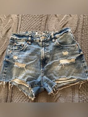 Chelsea High-Rise Distressed Denim Shorts in Light Blue